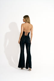 Calça flaire ilhós